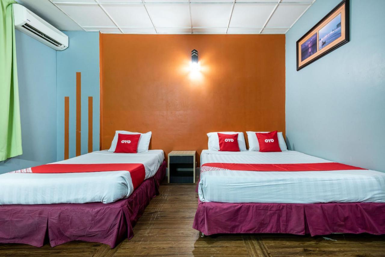 Oyo 89997 Kurnia Hotel 타와우 외부 사진